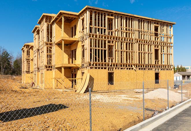 a snapshot of temporary chain link fences protecting a large construction project from unauthorized access in West Springfield